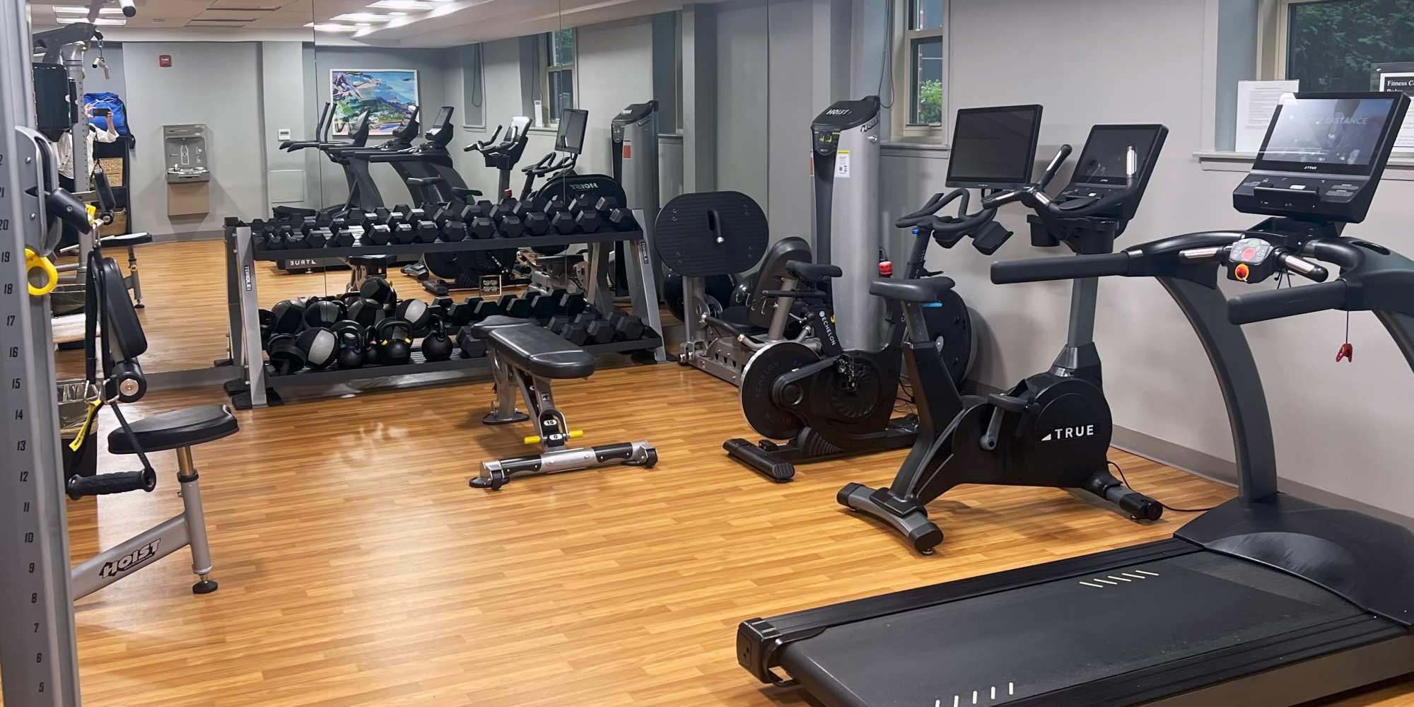Fitness center with cardio machines at Camelot Court in Brighton, Massachusetts