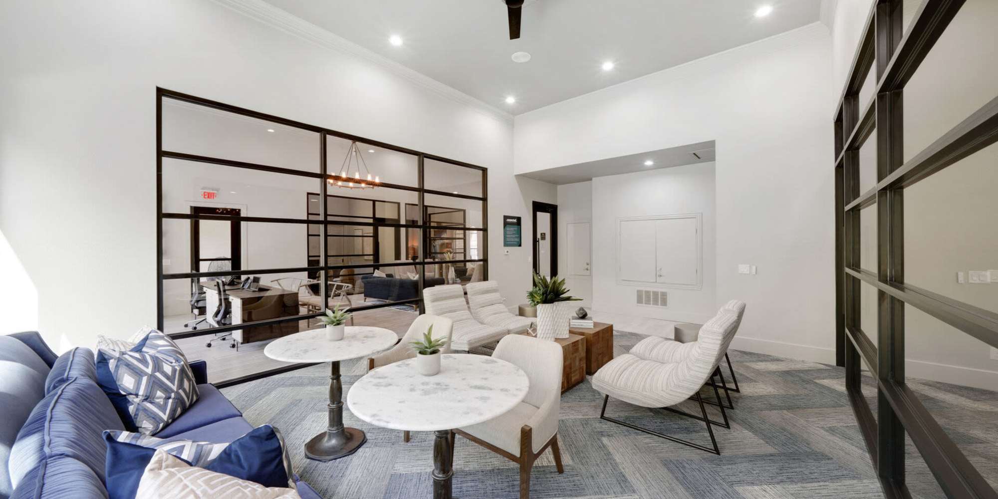 Upscale and large resident lounge with couches, tables at St. Martin in Frisco, Texas, 