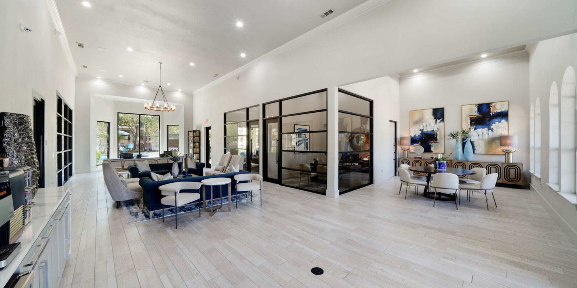Resident seating area with large couches at entrance of St. Martin in Frisco, Texas, 