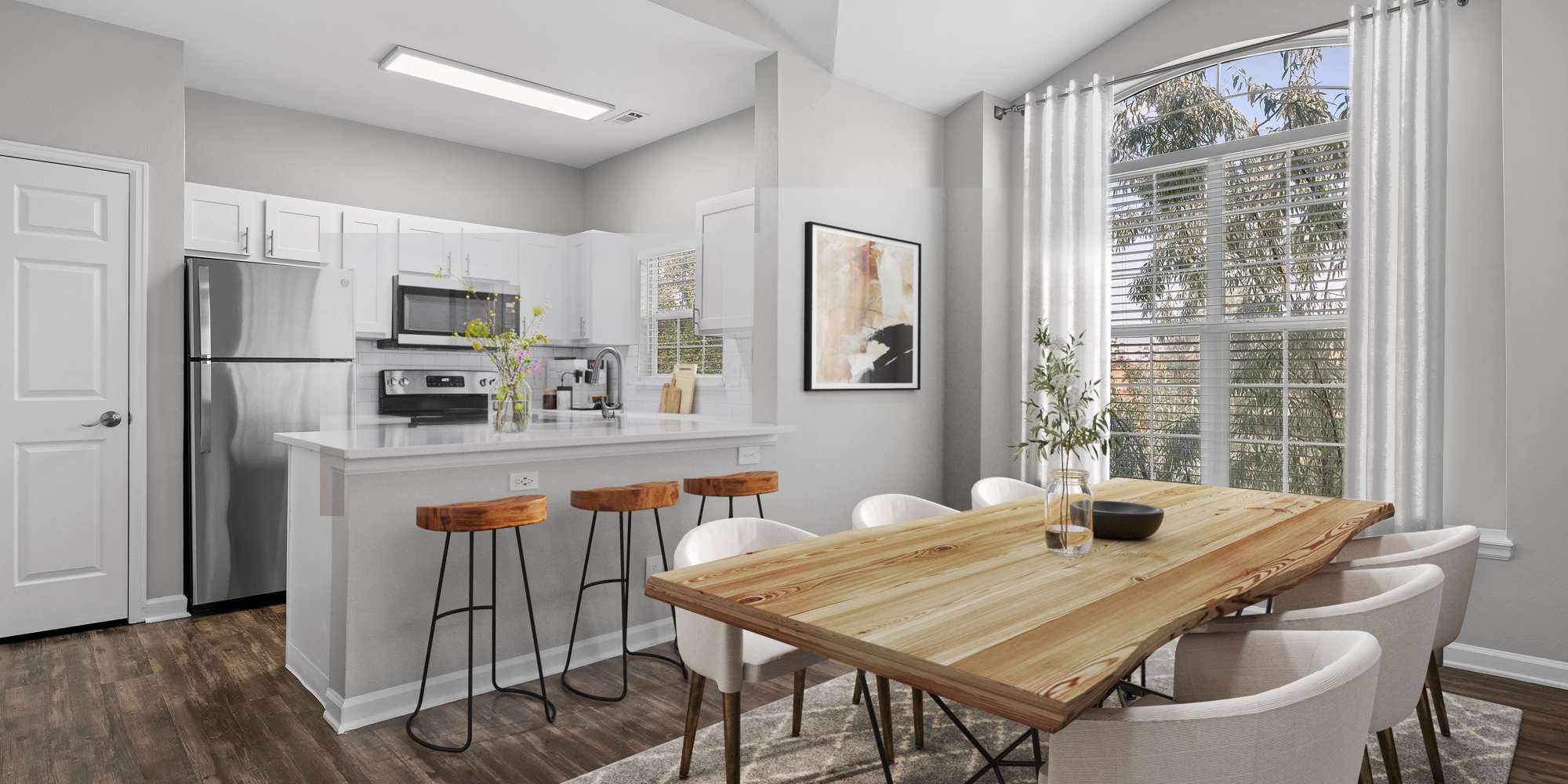 Newly renovated Kitchen and living room at Greenwood Village, Colorado, apartments at Isabella Apartment Homes
