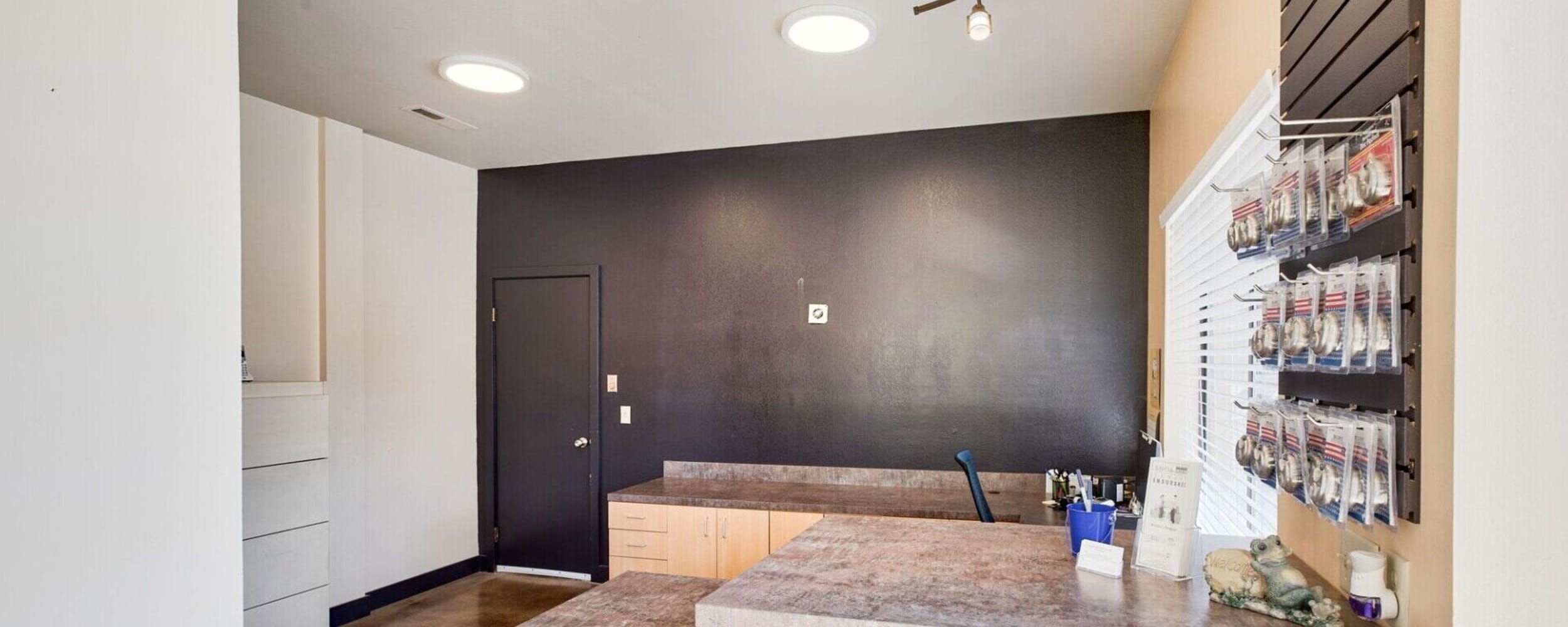 Lobby area with accent wall at Port Orchard Self Storage in Port Orchard, Washington