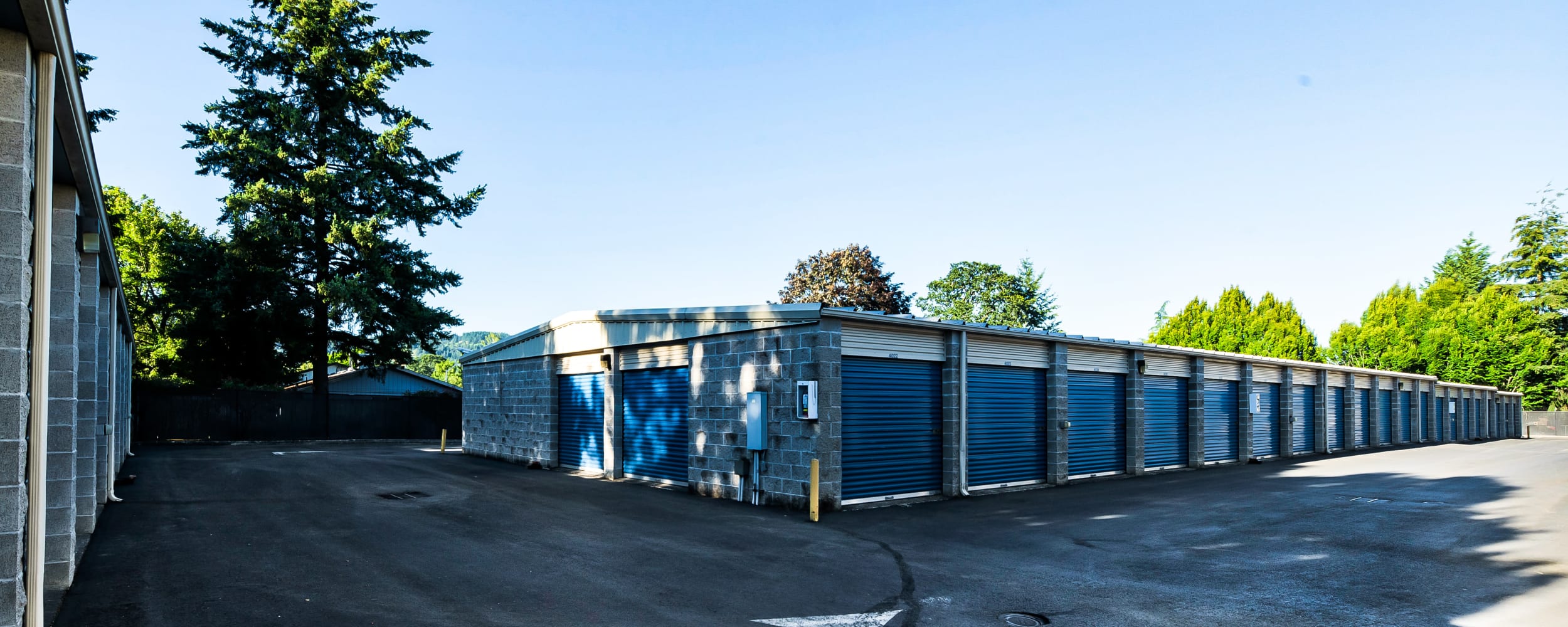 Large driveway with units on either side at Newberg Self Storage in Newberg, Oregon