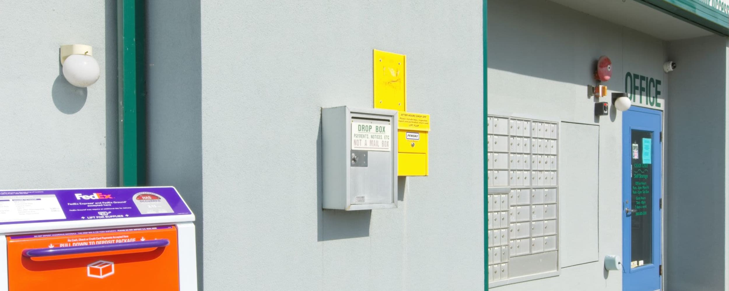 Building with a drop box and a row of mailboxes at Chain Lake Self Storage in Monroe, Washington