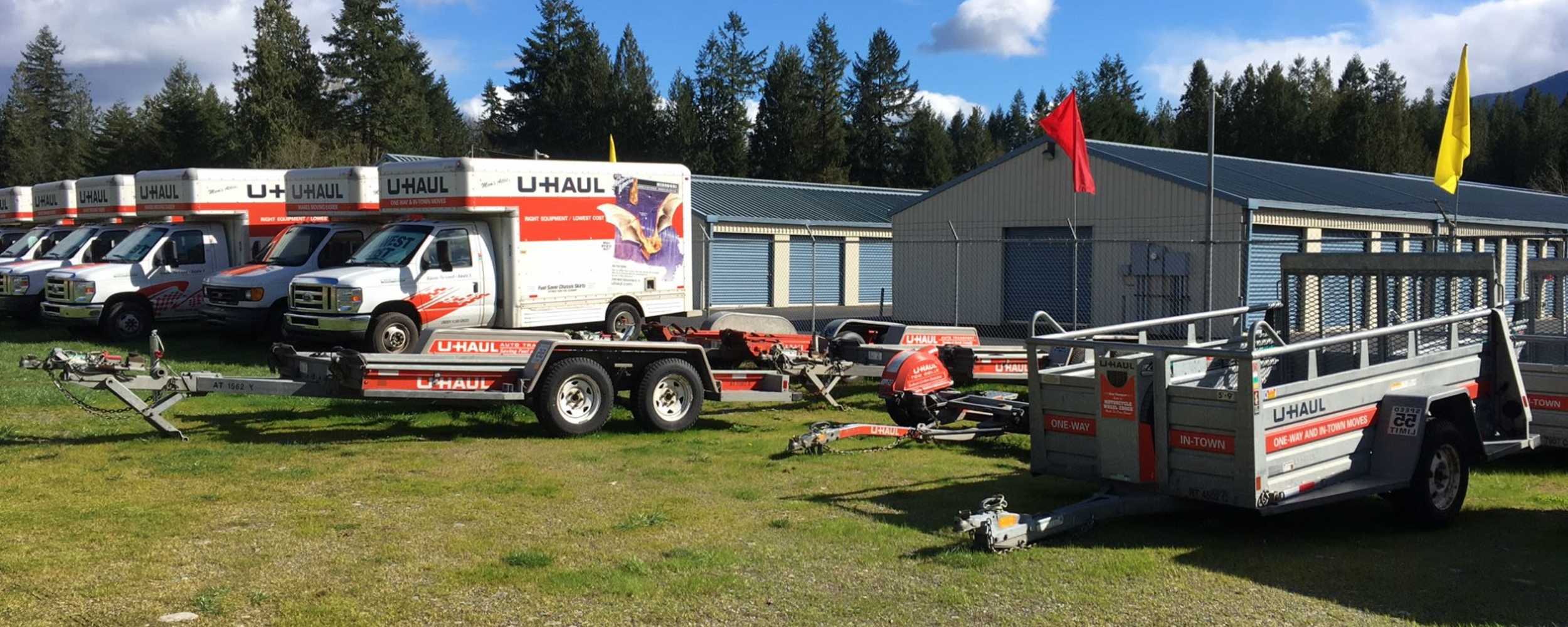 A storage facility parking lot featuring a variety of RVs parked closely together at Concrete Self Storage, Concrete, Washington