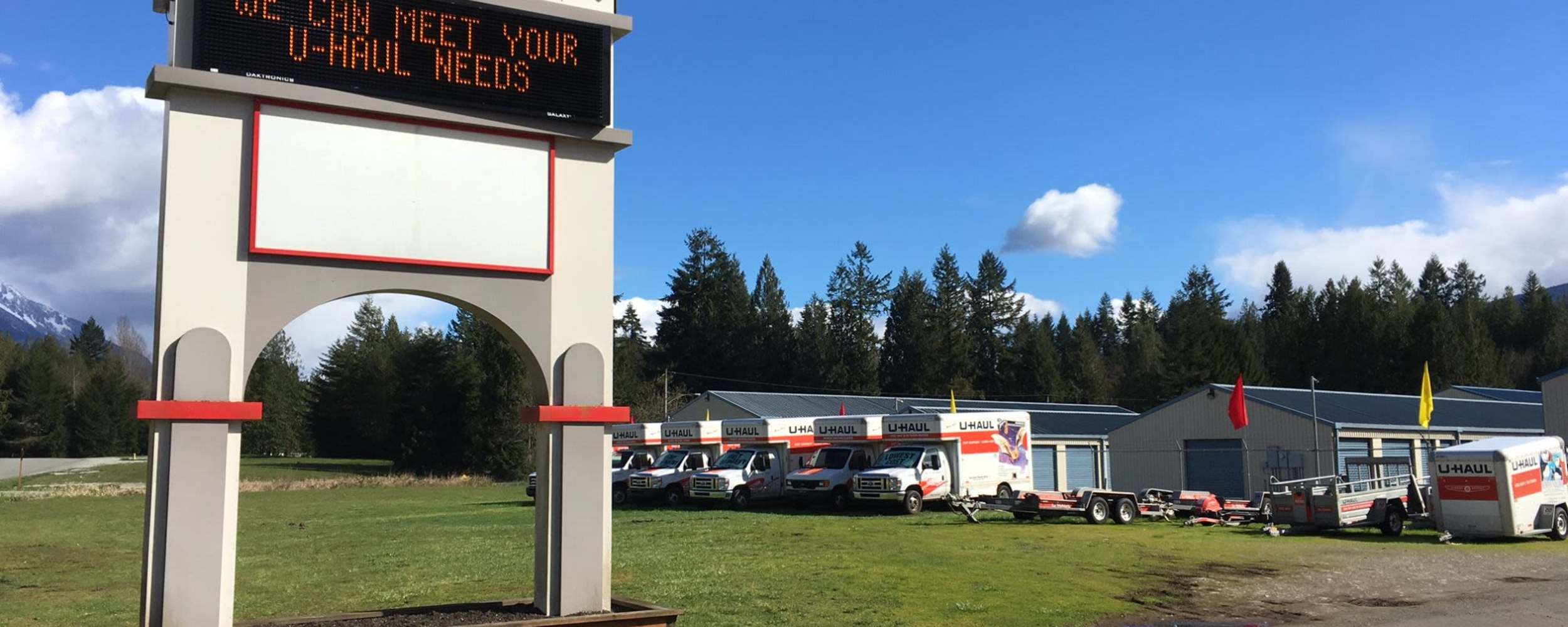 Facility parking lot with signage at Concrete Self Storage, Concrete, Washington