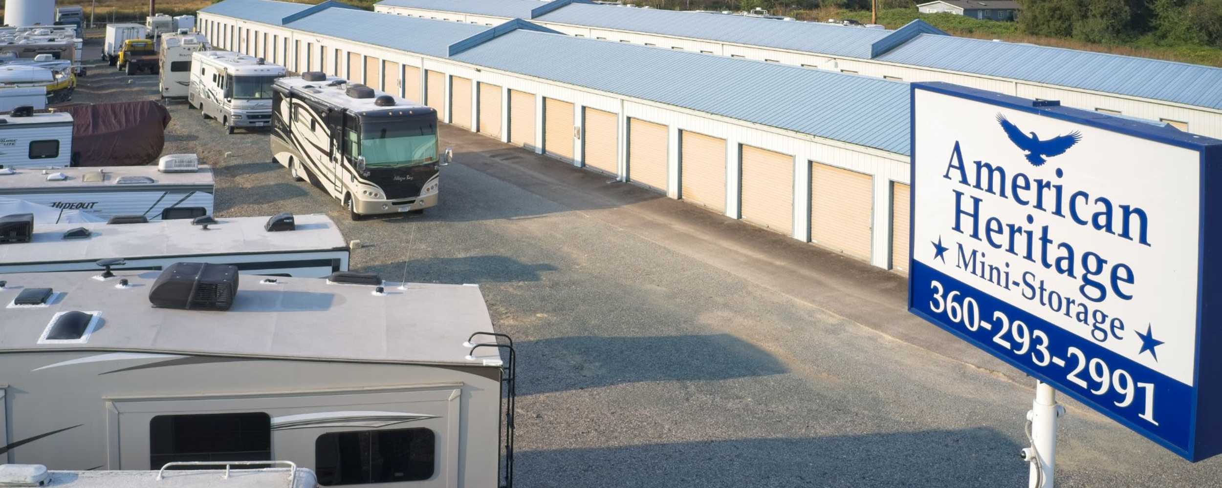 Facility parking lot with signage at American Heritage Mini Storage, Anacortes, Washington