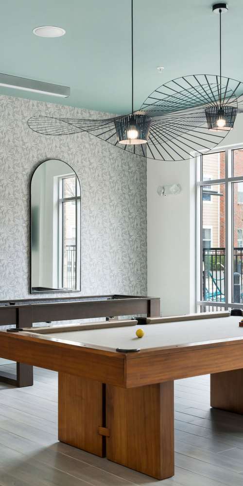 Lounge with a pool table at a Vesper Holdings property