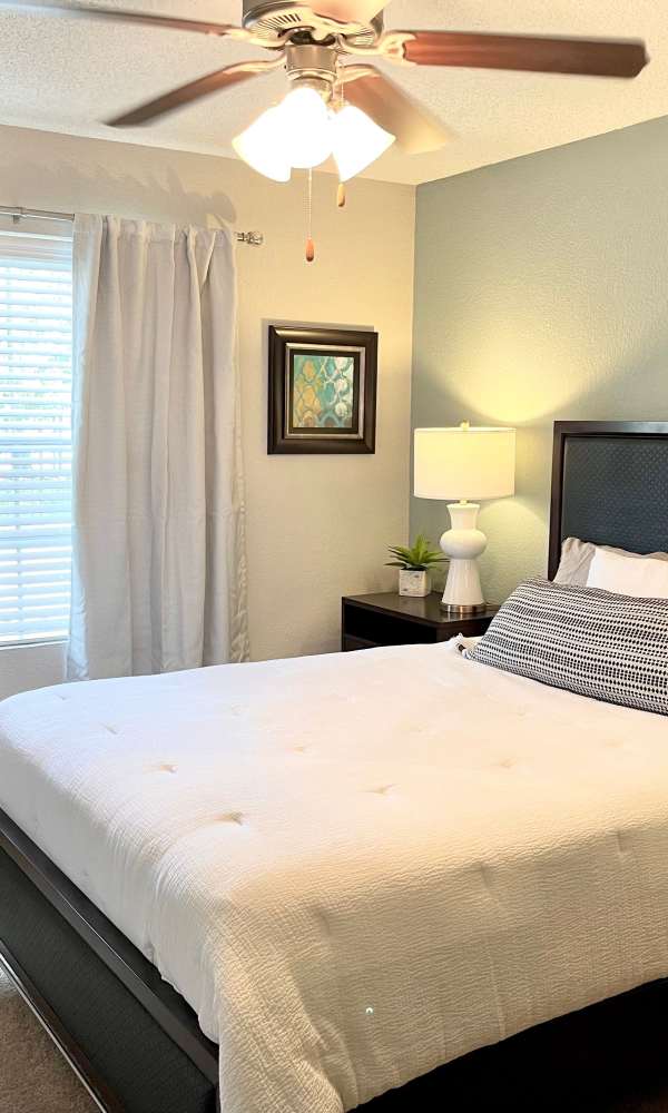 Cozy bedrooms at The Abbey at Copper Creek in San Antonio, Texas