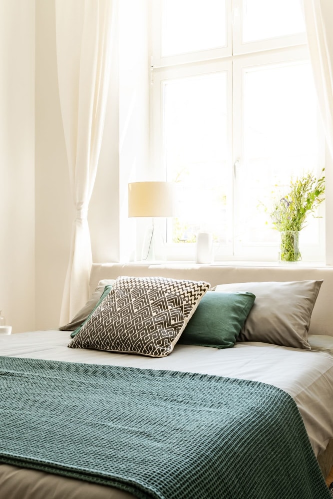 Cozy bedroom in a model home at Sun Housing in Shuqualak, Mississippi