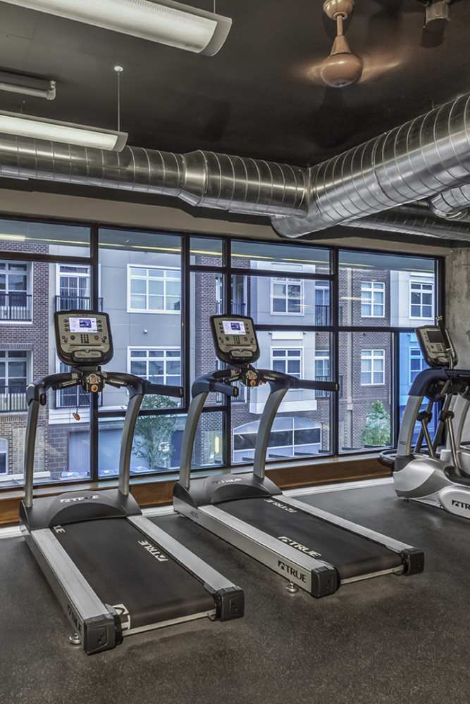  Well-equipped fitness center with multiple treadmills at Greenside in Charlotte, North Carolina