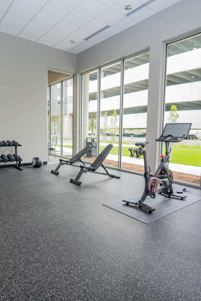 Fitness center with treadmills and cardio machines at Diamond Place II in Grand Rapids, Michigan