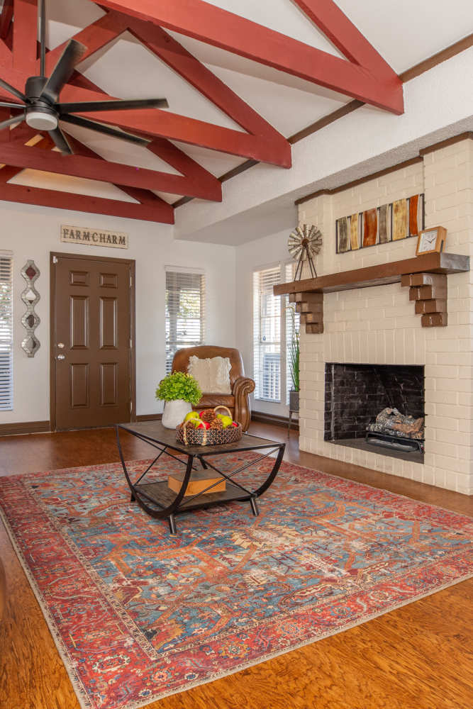 Indoor lounge with seating at Fredericksburg Place Apartments in San Antonio, Texas