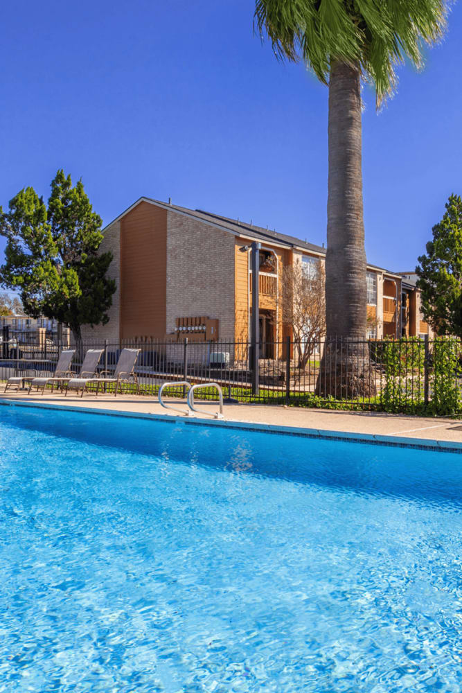 Resort-style swimming pool at Fredericksburg Place Apartments in San Antonio, Texas