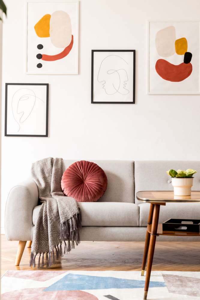 Living room with air condition at Grandview Garden Apartments in Florissant, Missouri