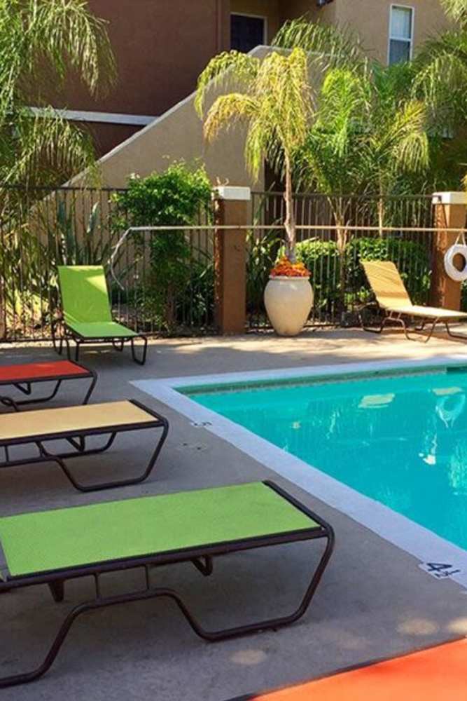 Sun loungers by the poolside at Willow Grove in Modesto, California