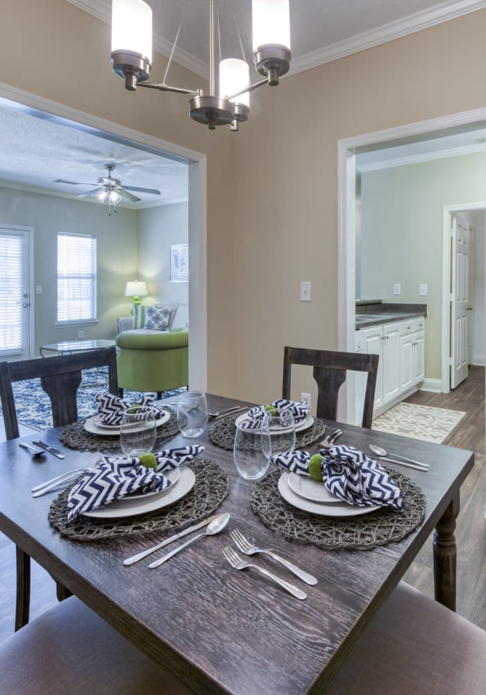 A furnished dining room in an apartment at Brighton Park in Byron, Georgia