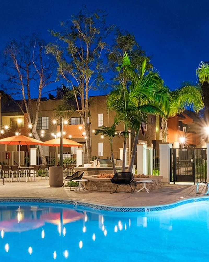 Resident pool with pool side seating at The Ranch at Moorpark in Moorpark, California