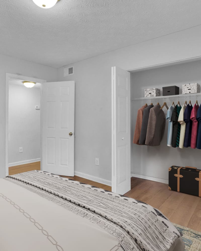 A main bedroom with a large closet at Residence at Riverside in Austell, Georgia