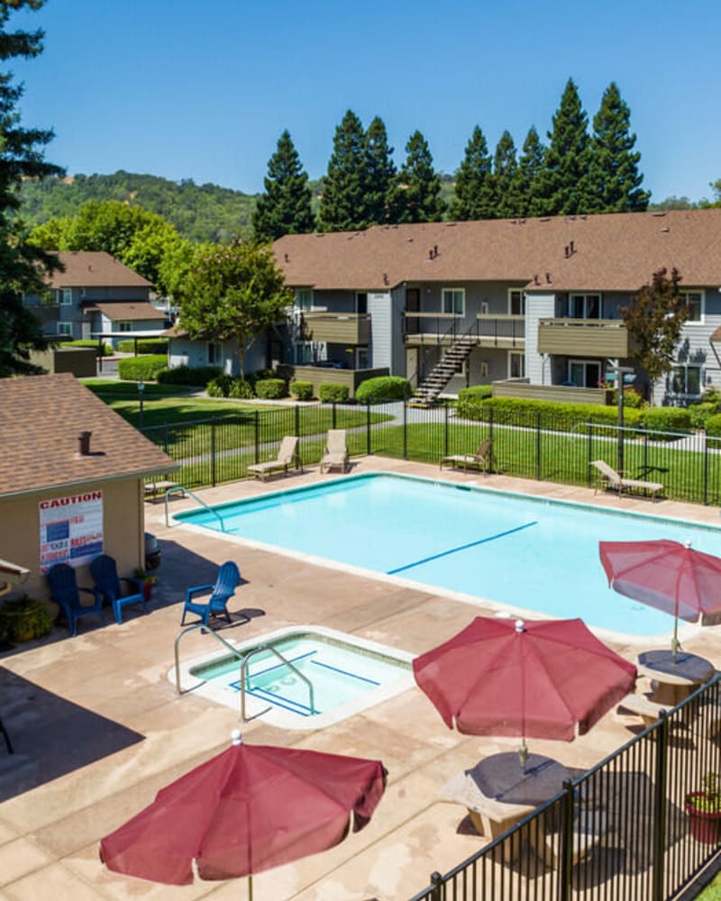 Umbrella by the pool at Creekside Park Apartments in Napa, California