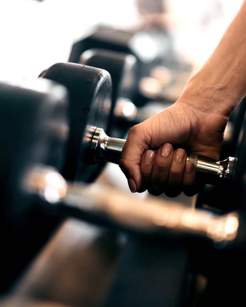 Fully-equipped gym with weights at Mosaic in Shelton, Connecticut