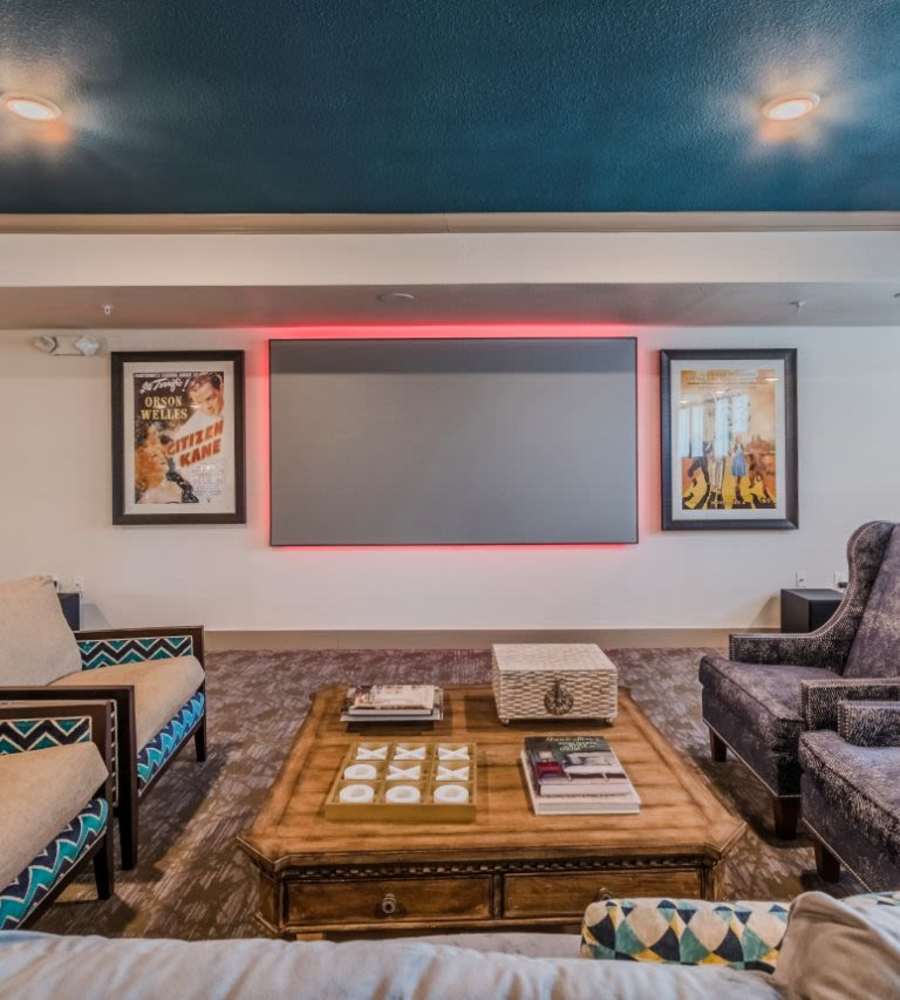 Game room with seating at Atlas Point at Prestonwood in Carrollton, TX