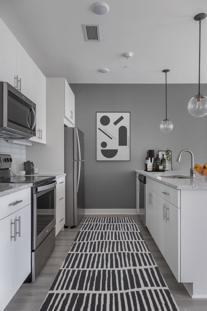 Gourmet kitchen in a model home at 50 Front Luxury Apartments in Binghamton, New York