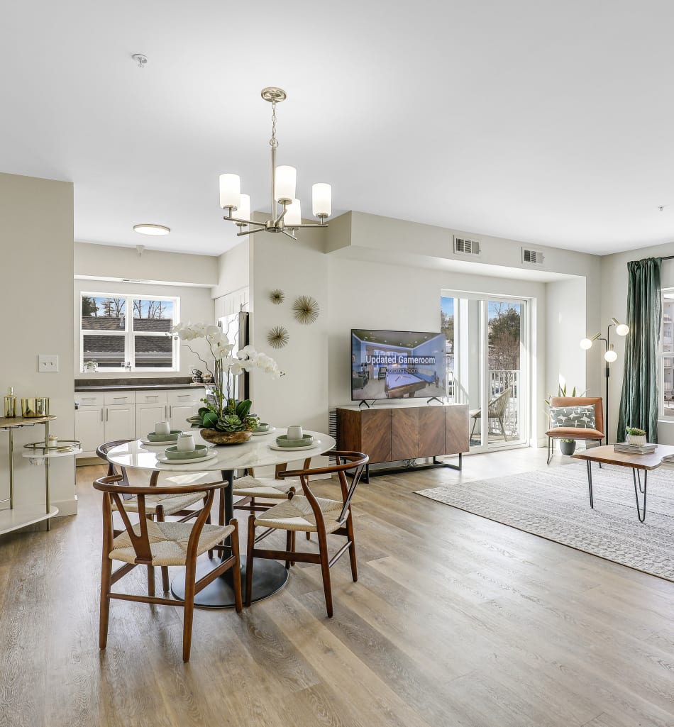 Bright and spacious living room with large window at Sofi Danvers in Danvers, Massachusetts