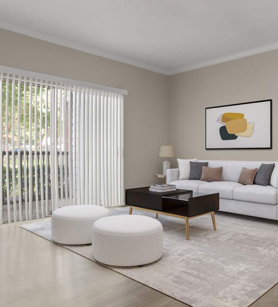 Modern living room with access to kitchen at Breckinridge Point Apartments in Richardson, Texas
