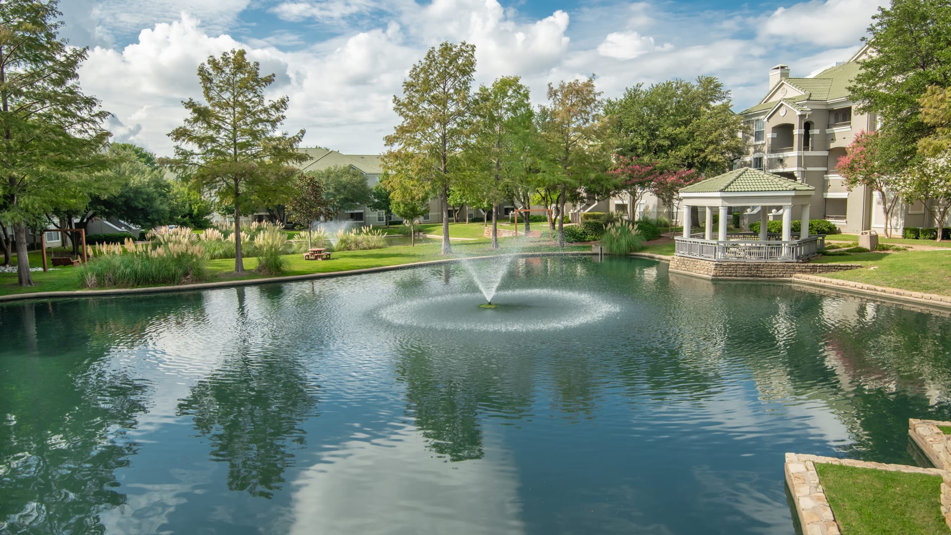 A luxury community with lake and fountains at Management Support 