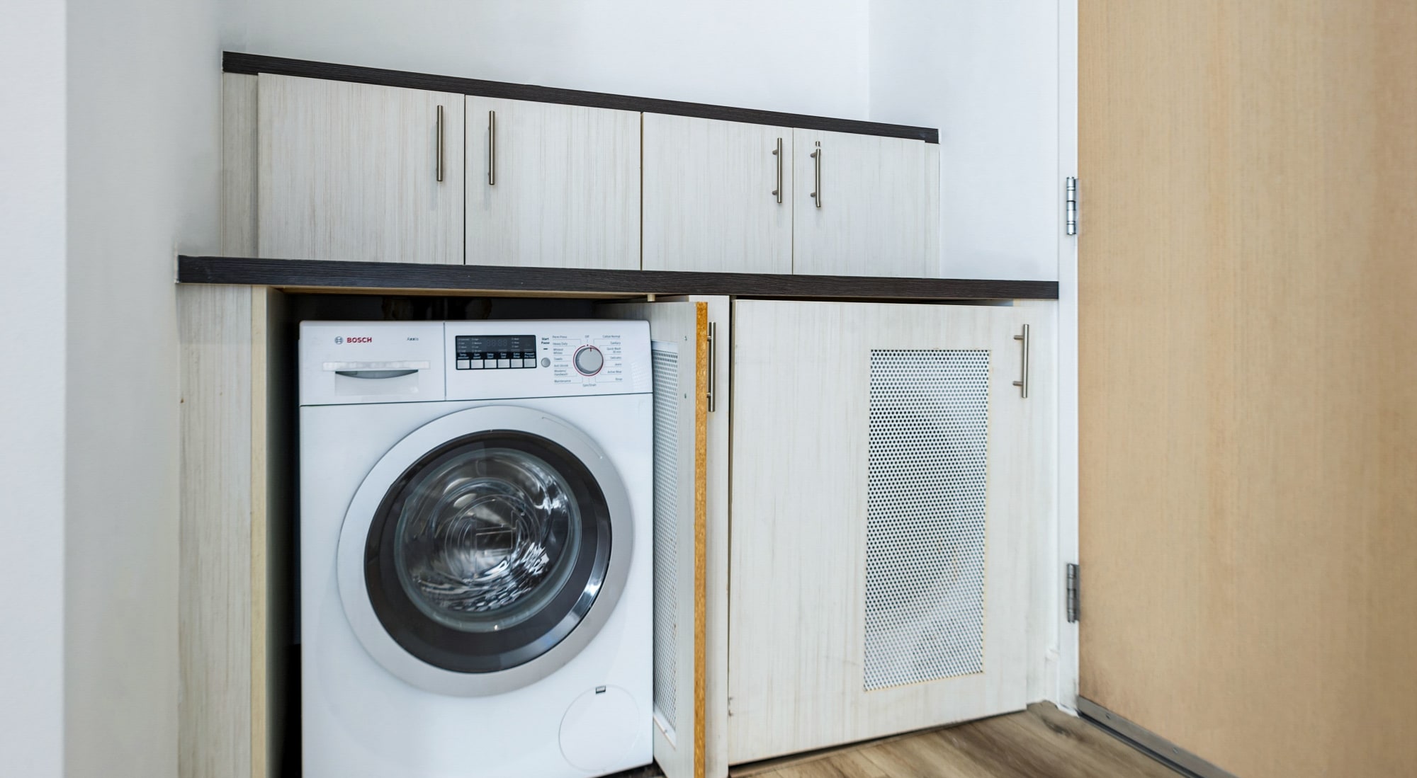Washer and dryer in apartment at The Vermont in Los Angeles, California