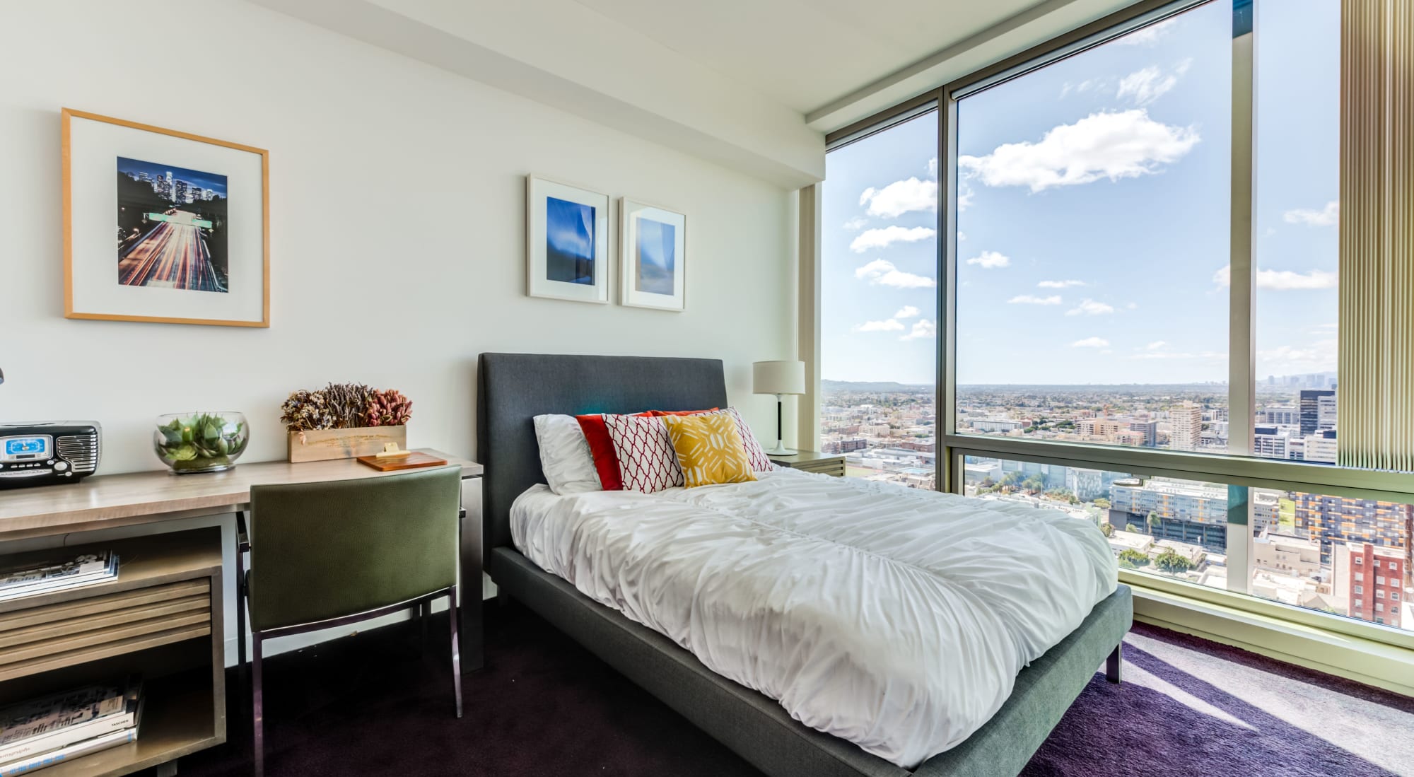 Well decorated bedroom with city view at The Vermont in Los Angeles, California