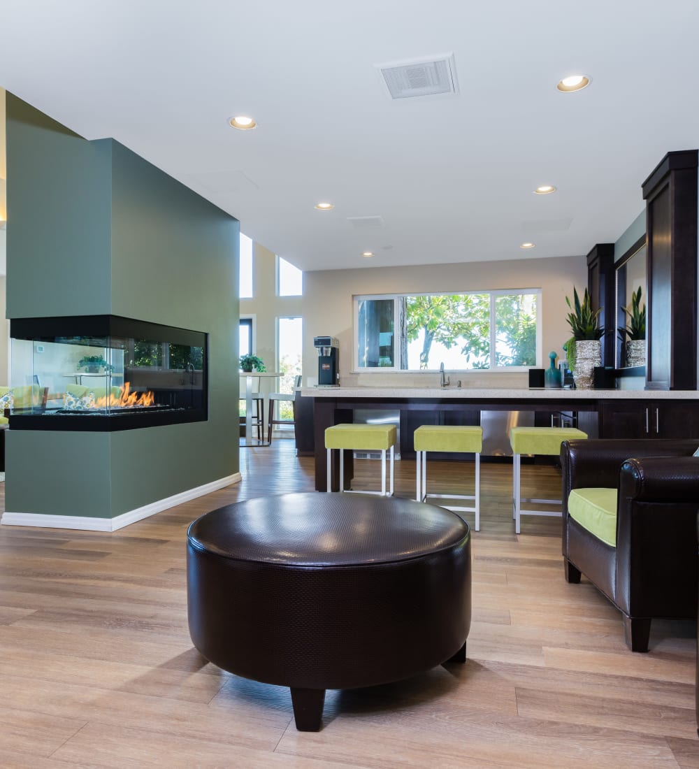 Well-decorated living area with an accent wall in a model home at Skyline at Murrayhill in Beaverton, Oregon