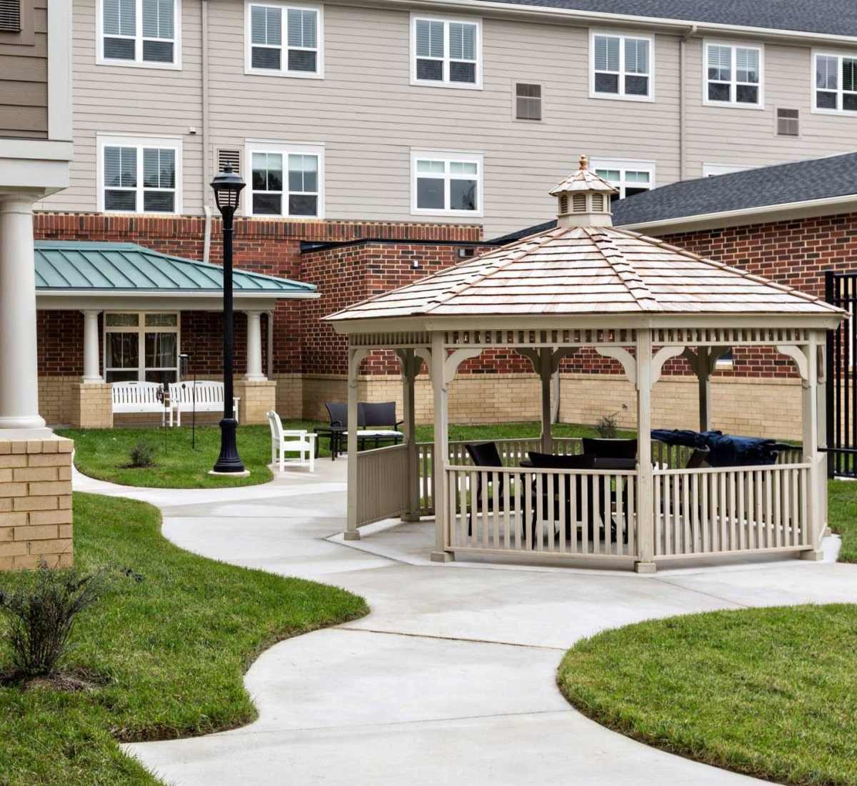 Courtyard surrounded by the buildings at The Harmony Collection at Hanover in Mechanicsville, Virginia