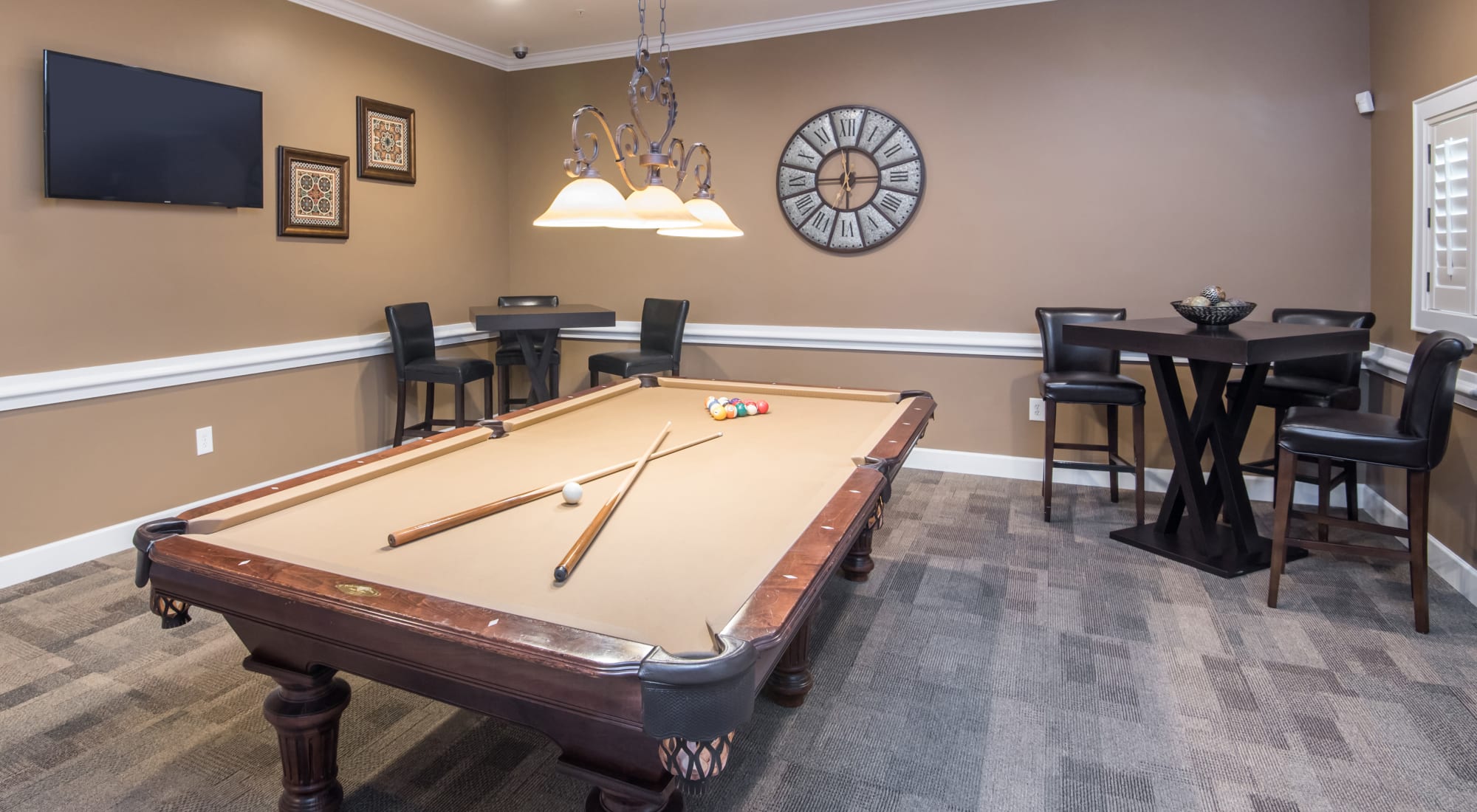 Game room with pool table at Estancia at Ridgeview Ranch