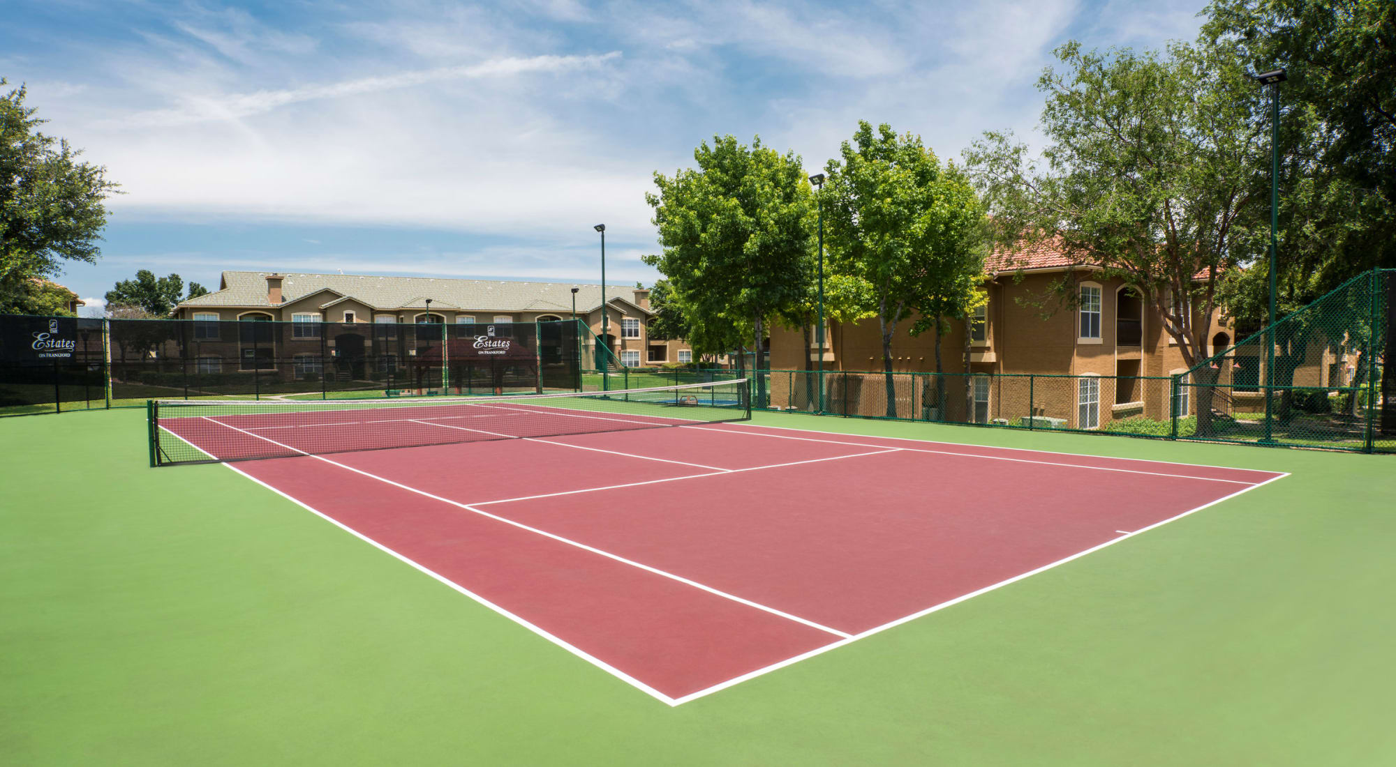 Lighted tennis court at Estates on Frankford