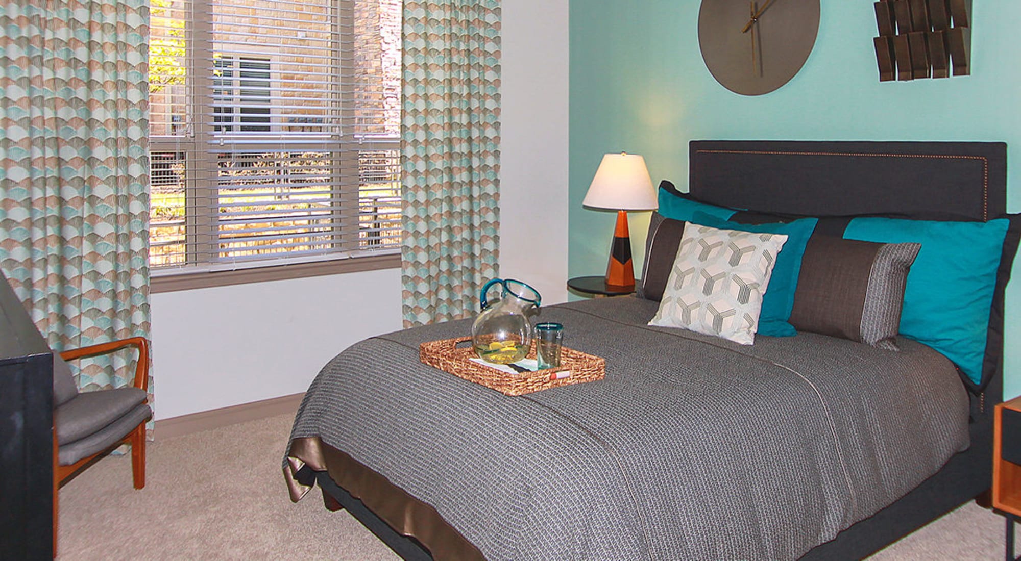 Spacious bedroom with large window at Estates of Richardson in Richardson, Texas