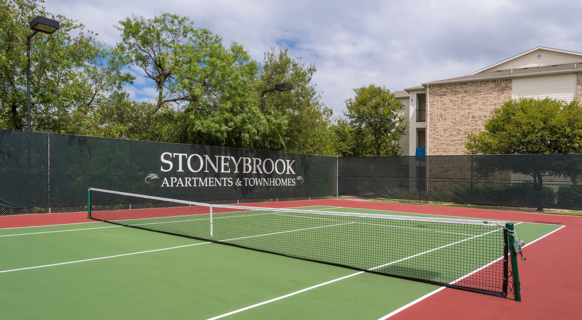 Lighted Tennis Court at Stoneybrook Apartments & Townhomes