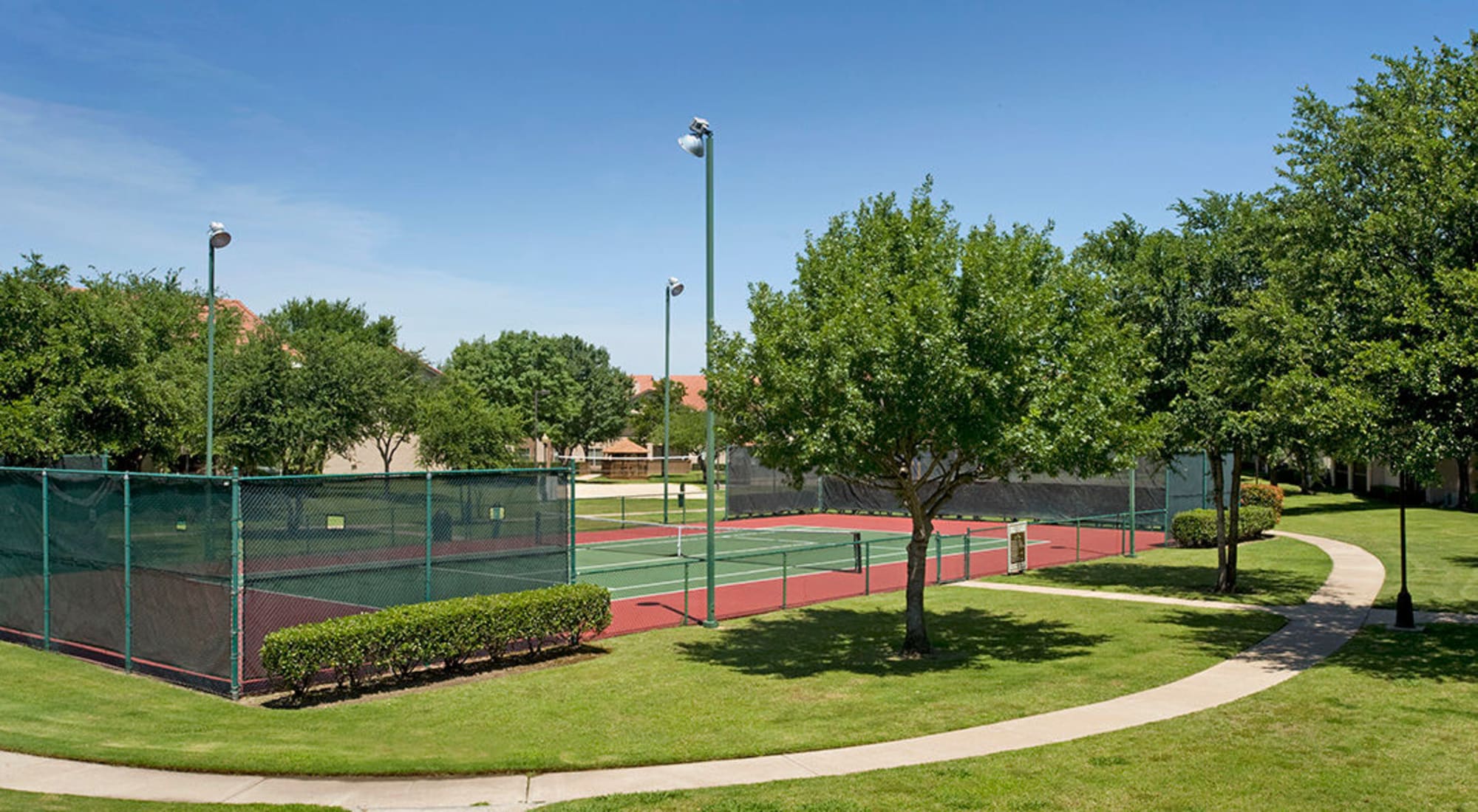 Lighted Tennis Court at Villas of Preston Creek