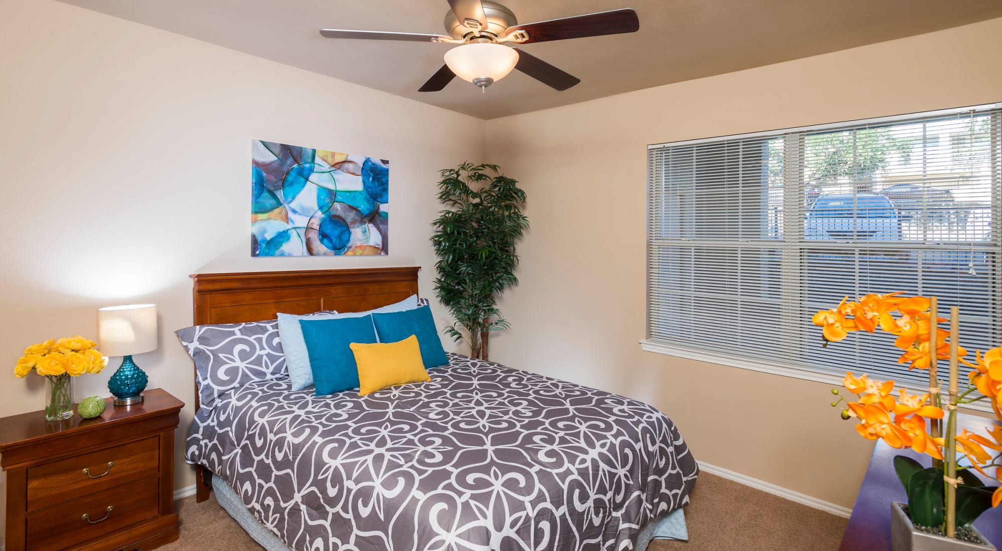 Bedroom with lighted ceiling fan at Mira Vista at La Cantera