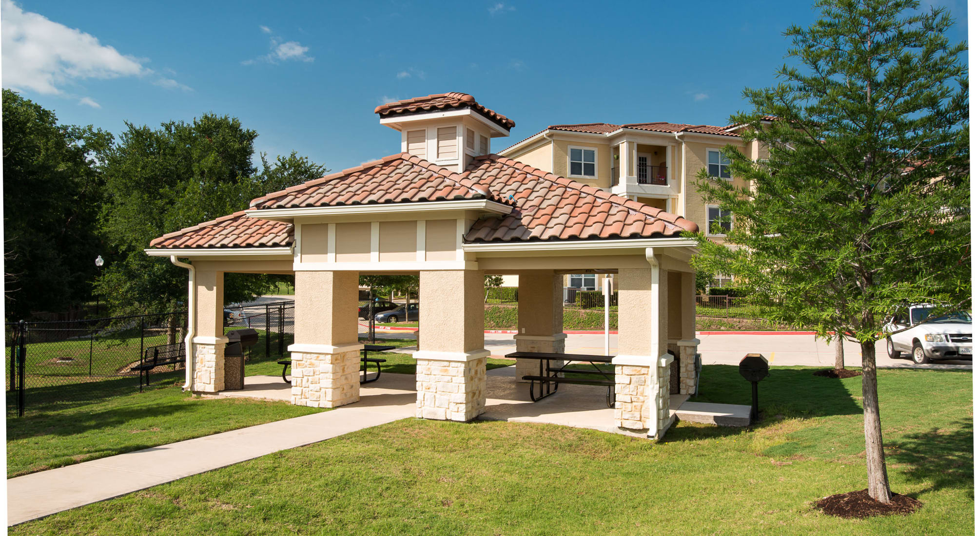 Clubhouse and outdoor pool at Estancia at Ridgeview Ranch in Plano, Texas