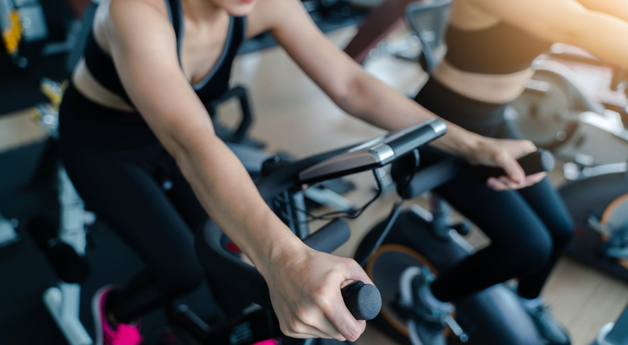 Residents getting in shape in the onsite fitness center at Baypoint in Corpus Christi, Texas
