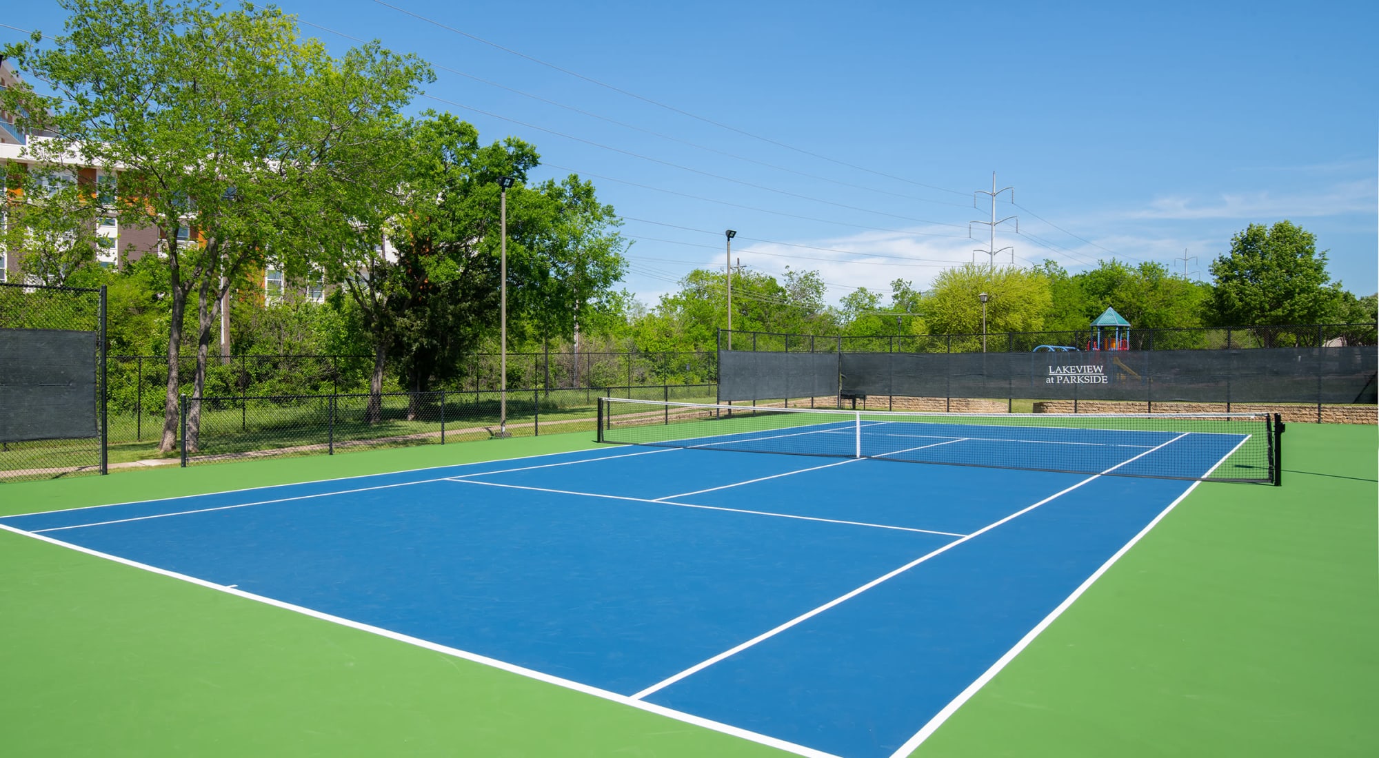 Lighted tennis court at the Lakeview at Parkside 