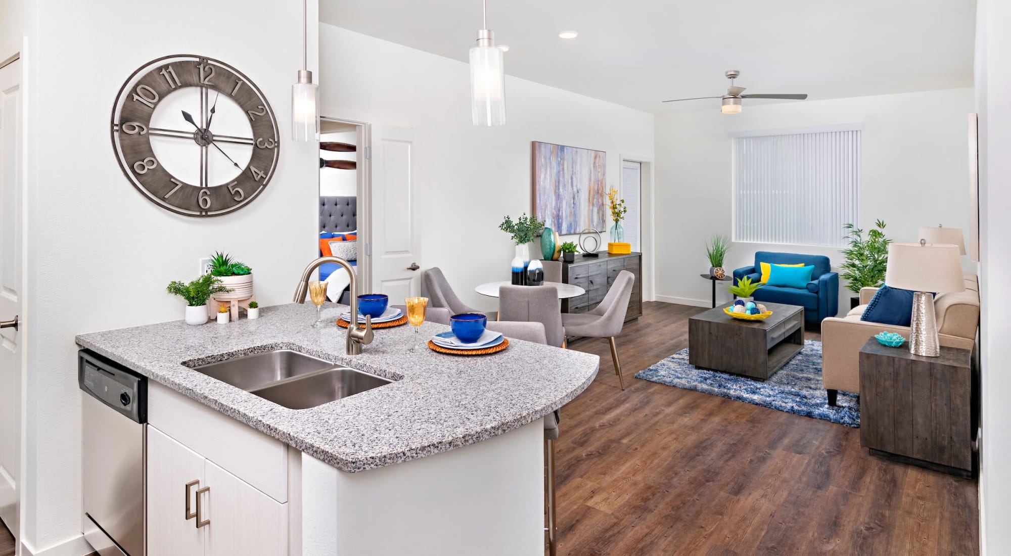 Kitchen island and living room at Sky at Chandler Airpark