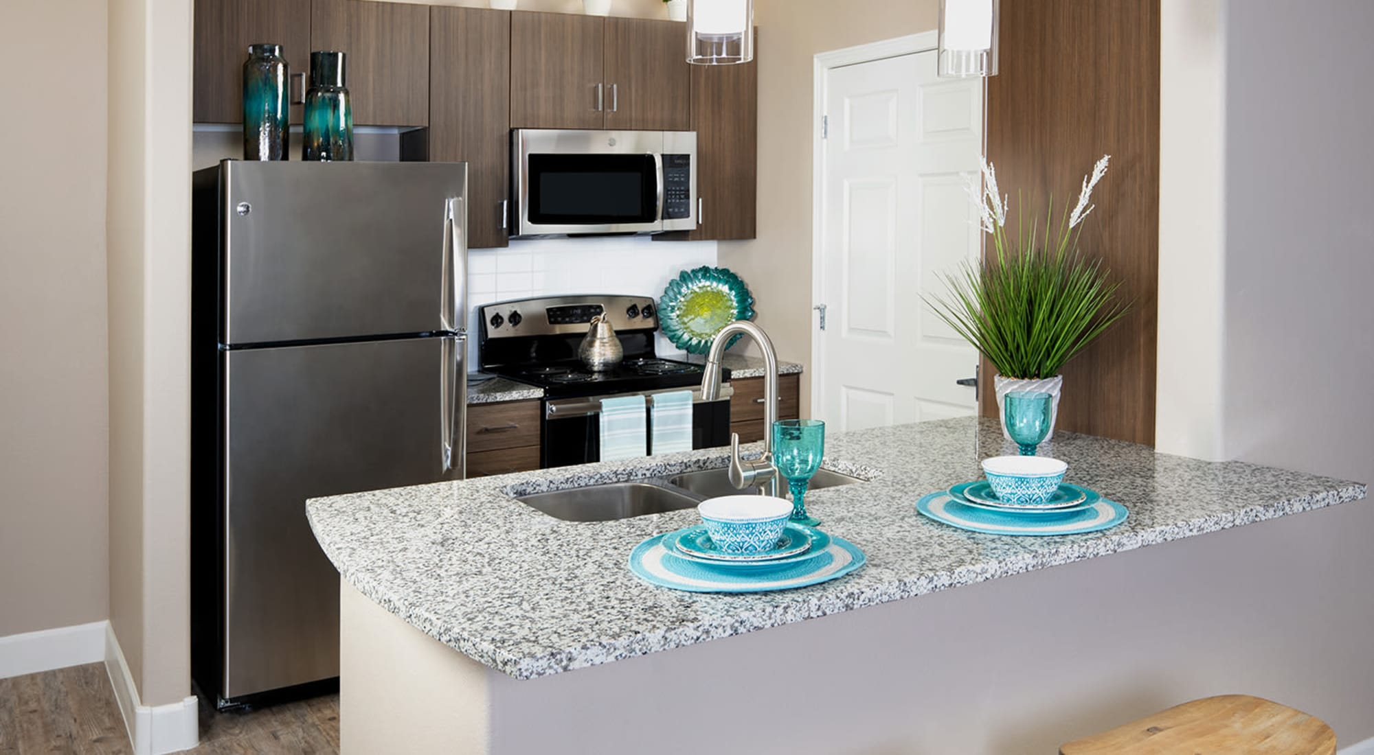 Kitchen with granite countertops at Southern Avenue Villas