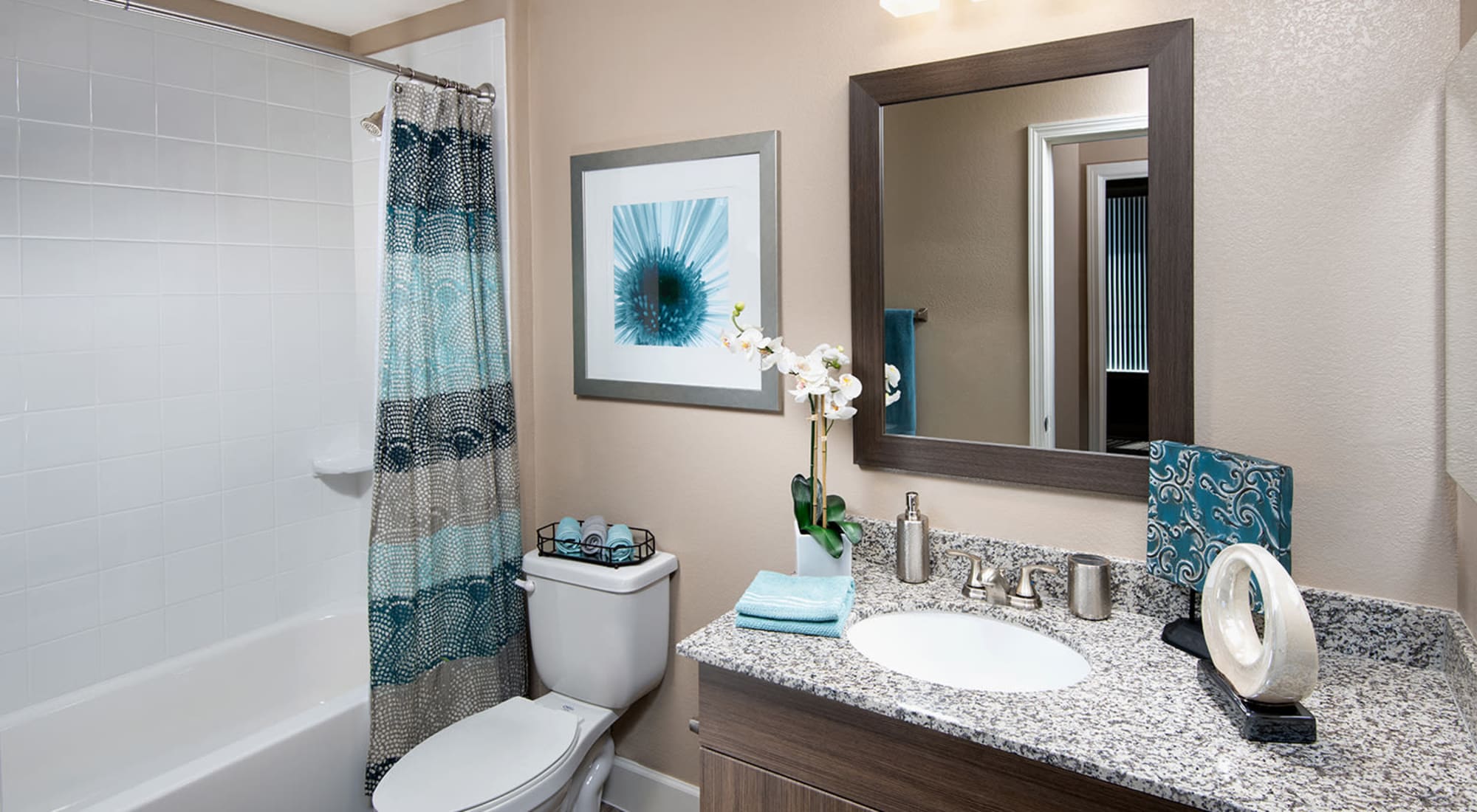 Bathroom with shower and sink at Southern Avenue Villas
