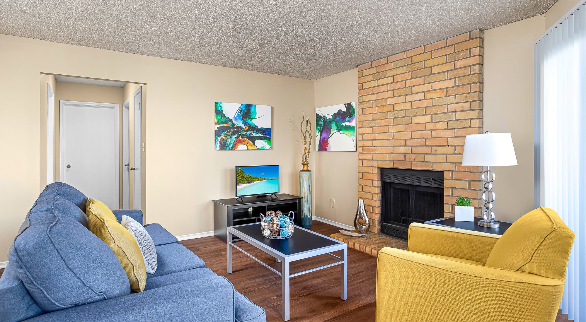 Living Room with fireplace at Stoneybrook Apartments and Townhomes