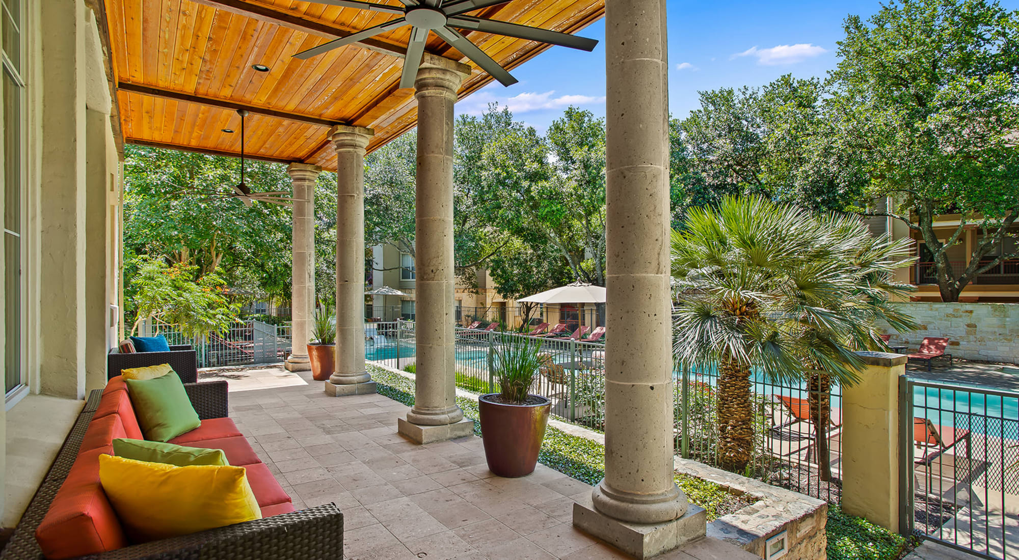 Lounge area next to the pool at Sedona Ranch Apartments in San Antonio, Texas