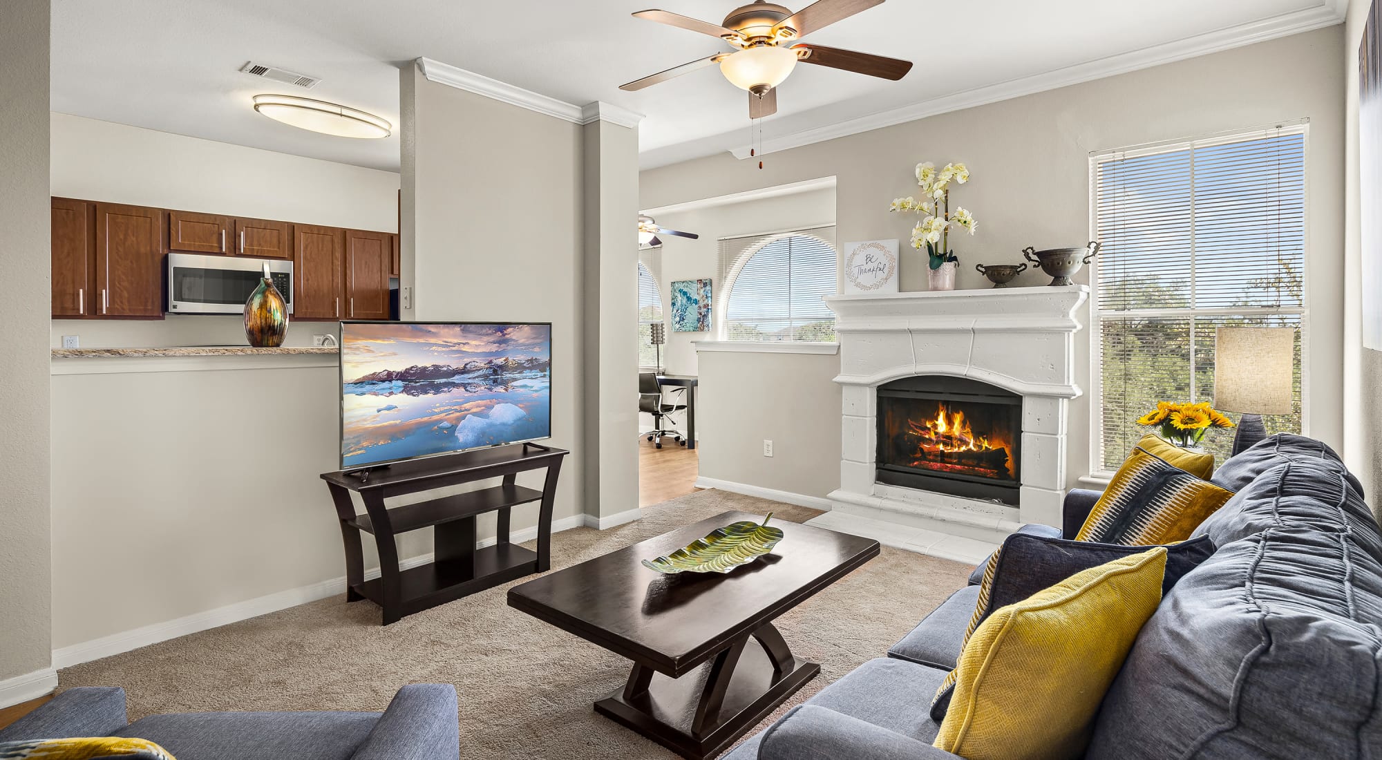 Living room with fireplace at Sedona Ranch