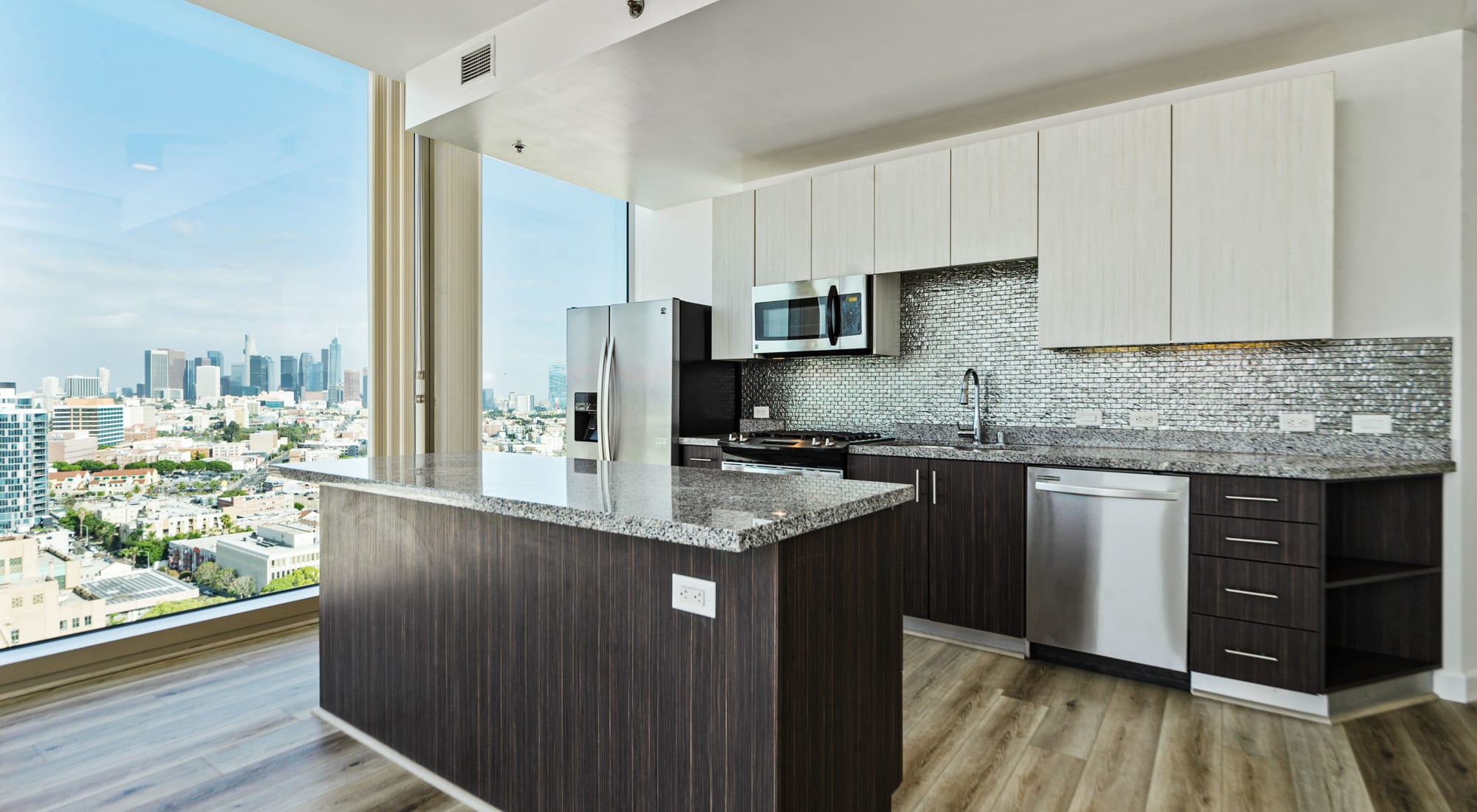 Modern kitchen with ample room and a view at The Vermont in Los Angeles, California
