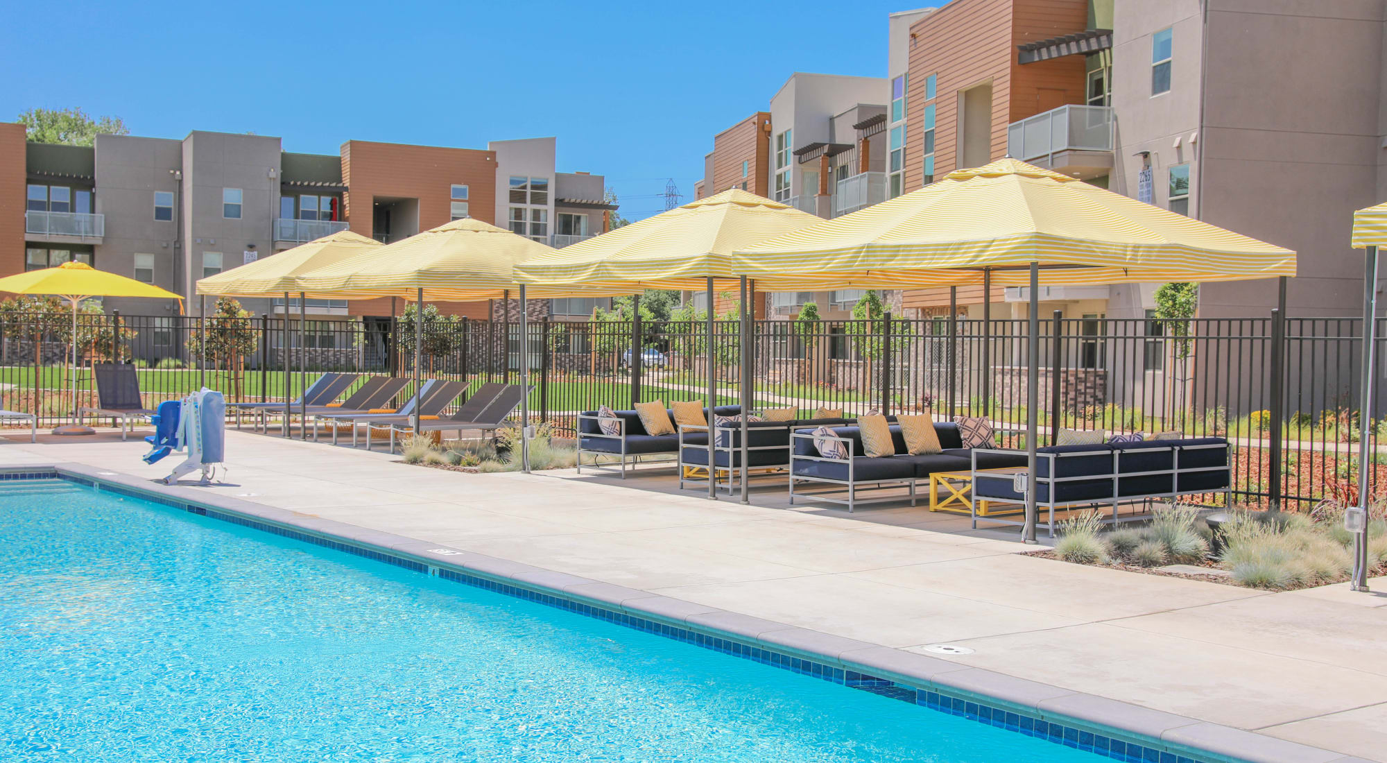 Outdoor swimming pool at Sutter Green Apartments in Sacramento, California